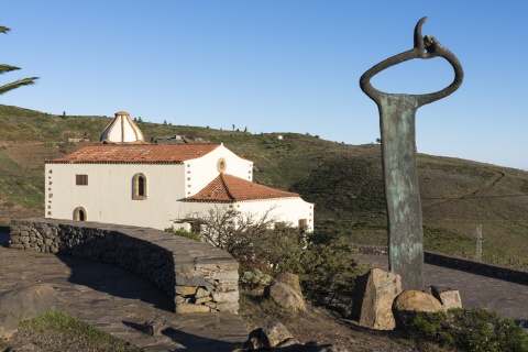 Monument to the whistled language and Church of San Francisco in Chipude (La Gomera, Canary Islands)