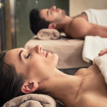 Couple relaxing during a spa treatment