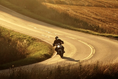 Motorcyclist riding on a road