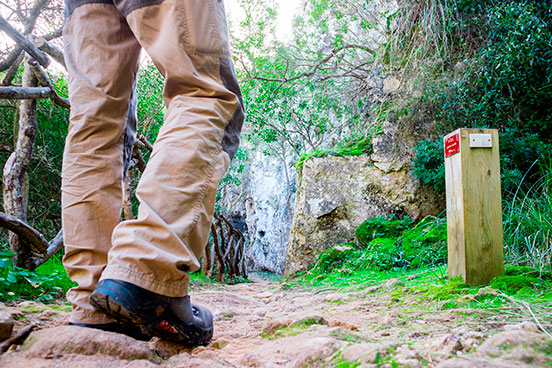 Hiker on the Camí de Cavalls, Menorca