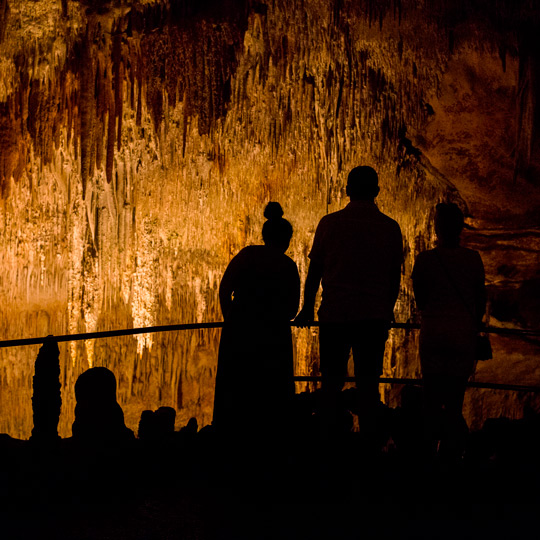 Visitors inside the Caves of Drach in Mallorca
