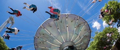 Visitors climbing aboard the Mr.Freeze Ice Factory ride at Parque Warner in Madrid, Region of Madrid