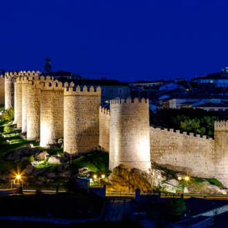 View of Avila city walls at night
