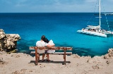 Couple gazing at the sea in the Balearic Islands